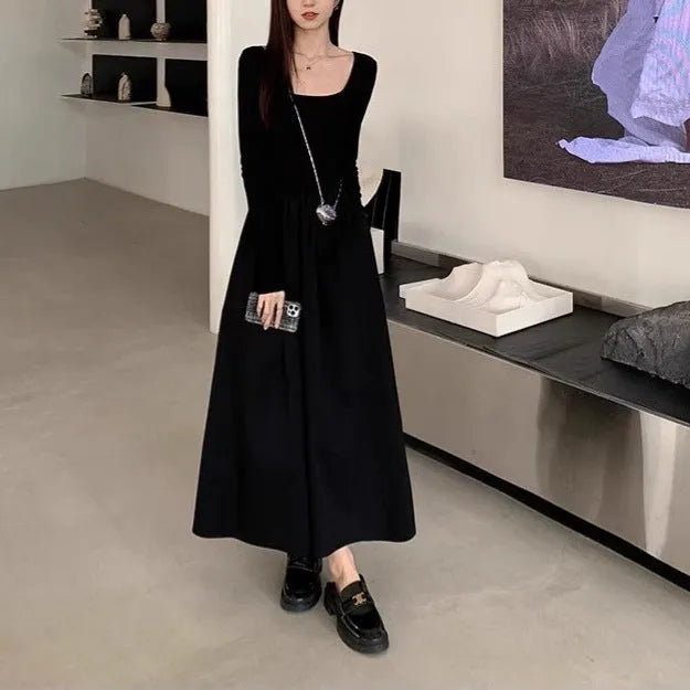 Women's black square collar knitted A-line dress with long sleeves and elastic waist.