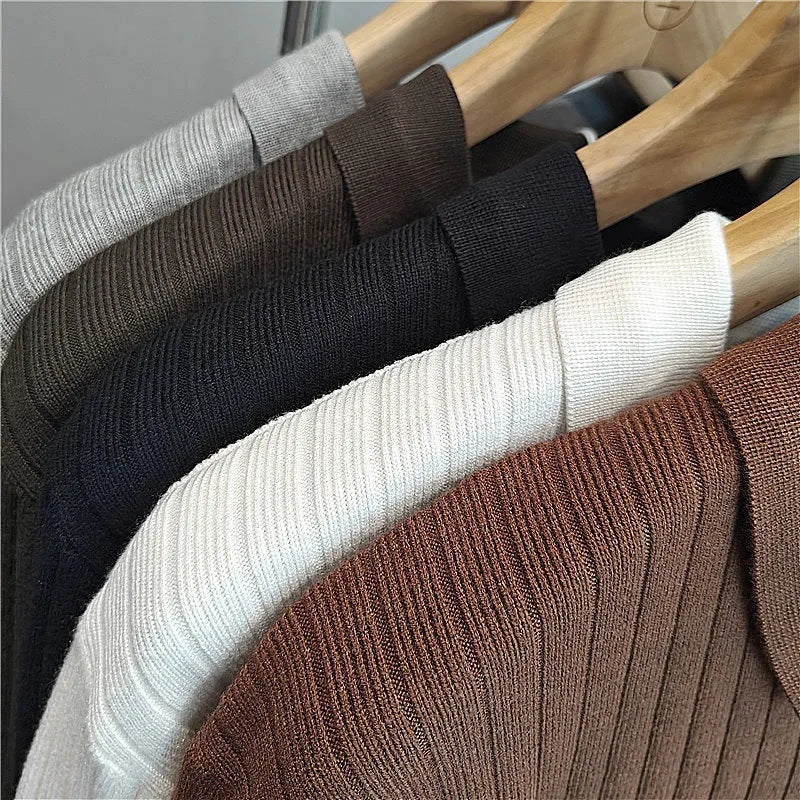 Men's loose grey modal knit sweater with rabbit fur trim detail on the chest, long sleeves.