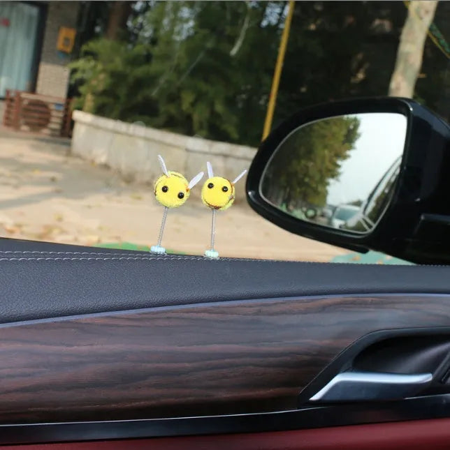 Small furry brown and yellow cartoon bee car decoration ornament measuring 3cm