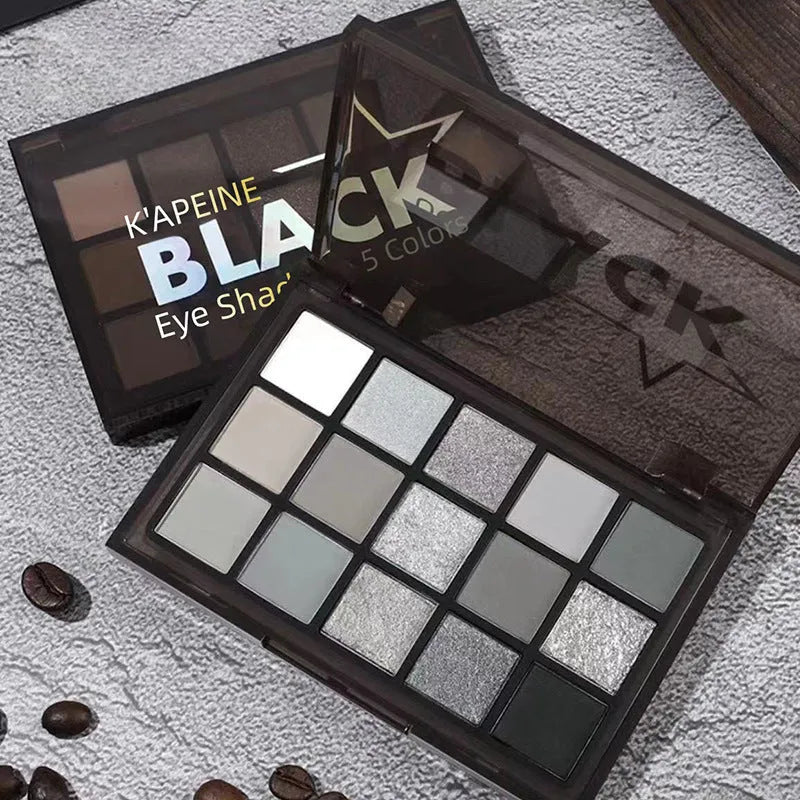 15-colour eye shadow palette showing matte and shimmer pans in brown and blue earth tones