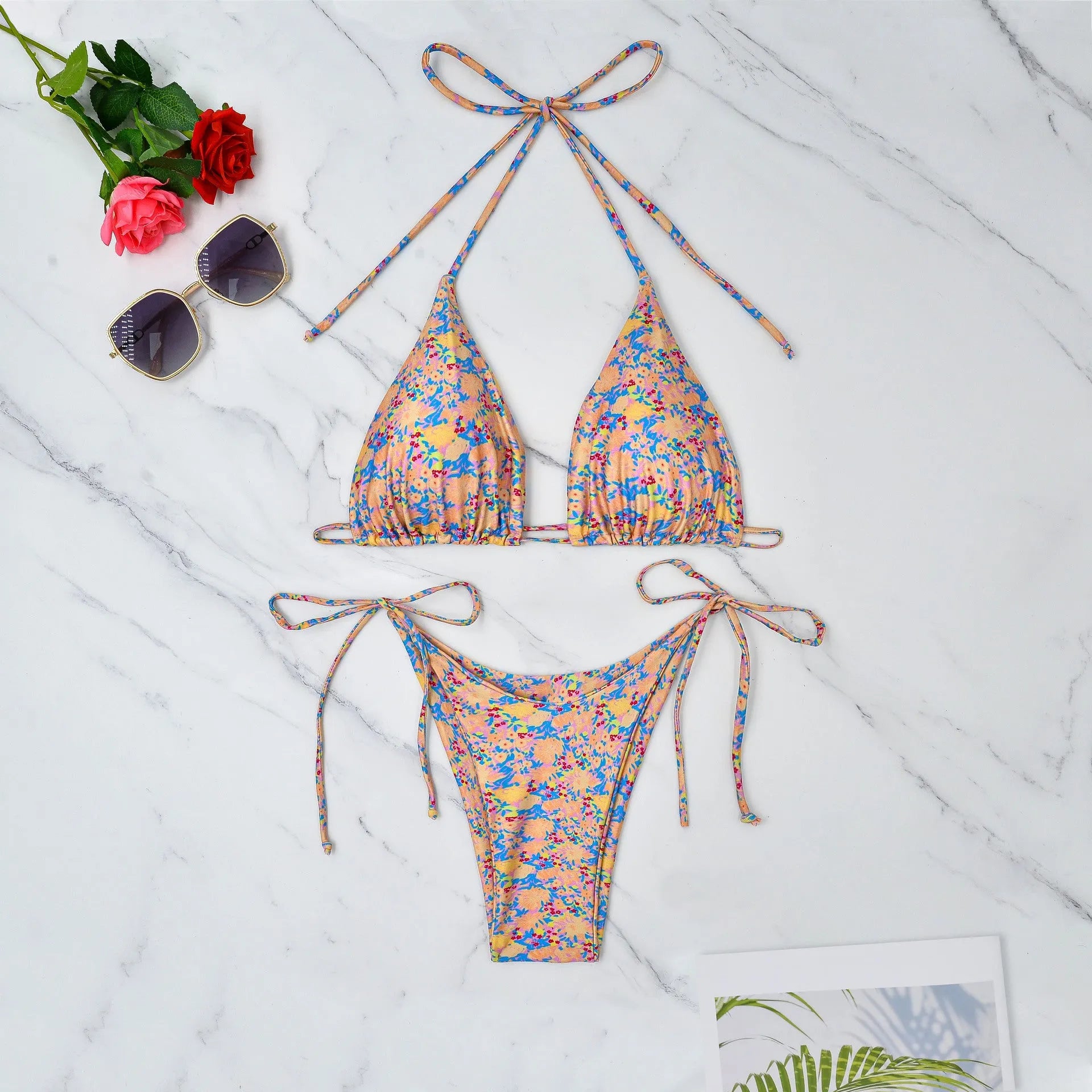 Lace-up bikini swimsuit set with sleeveless top and split briefs in polyester fabric