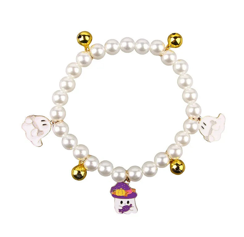 Purple Halloween cat collar decoration with simulated pearl necklace and pumpkin charm design