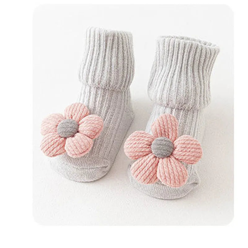 Cotton baby floor socks with anti-slip soles in animal designs for infants and toddlers
