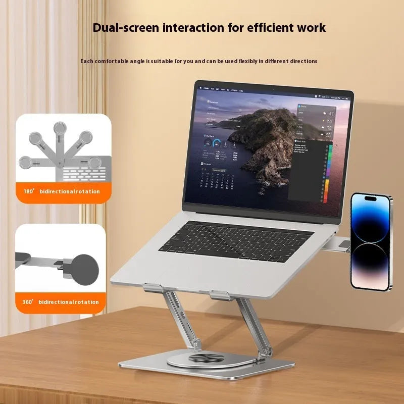 Silver carbon steel laptop stand with a rotatable magnetic phone holder attached, shown supporting a laptop.