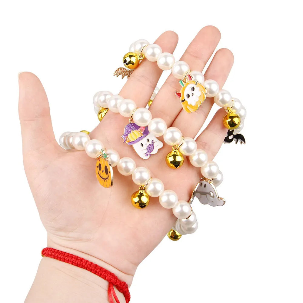 Purple Halloween cat collar decoration with simulated pearl necklace and pumpkin charm design