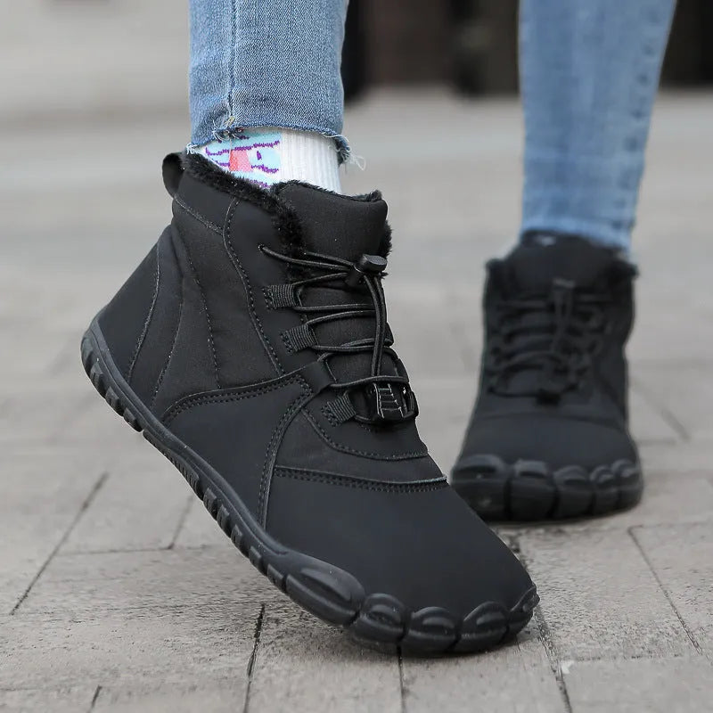 Outdoor snow boots in black, khaki, or pink with a lace-up front and rubber sole.