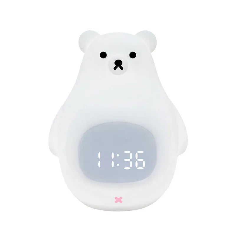 White silicone bear-shaped night light with colour-changing lights and a remote control.