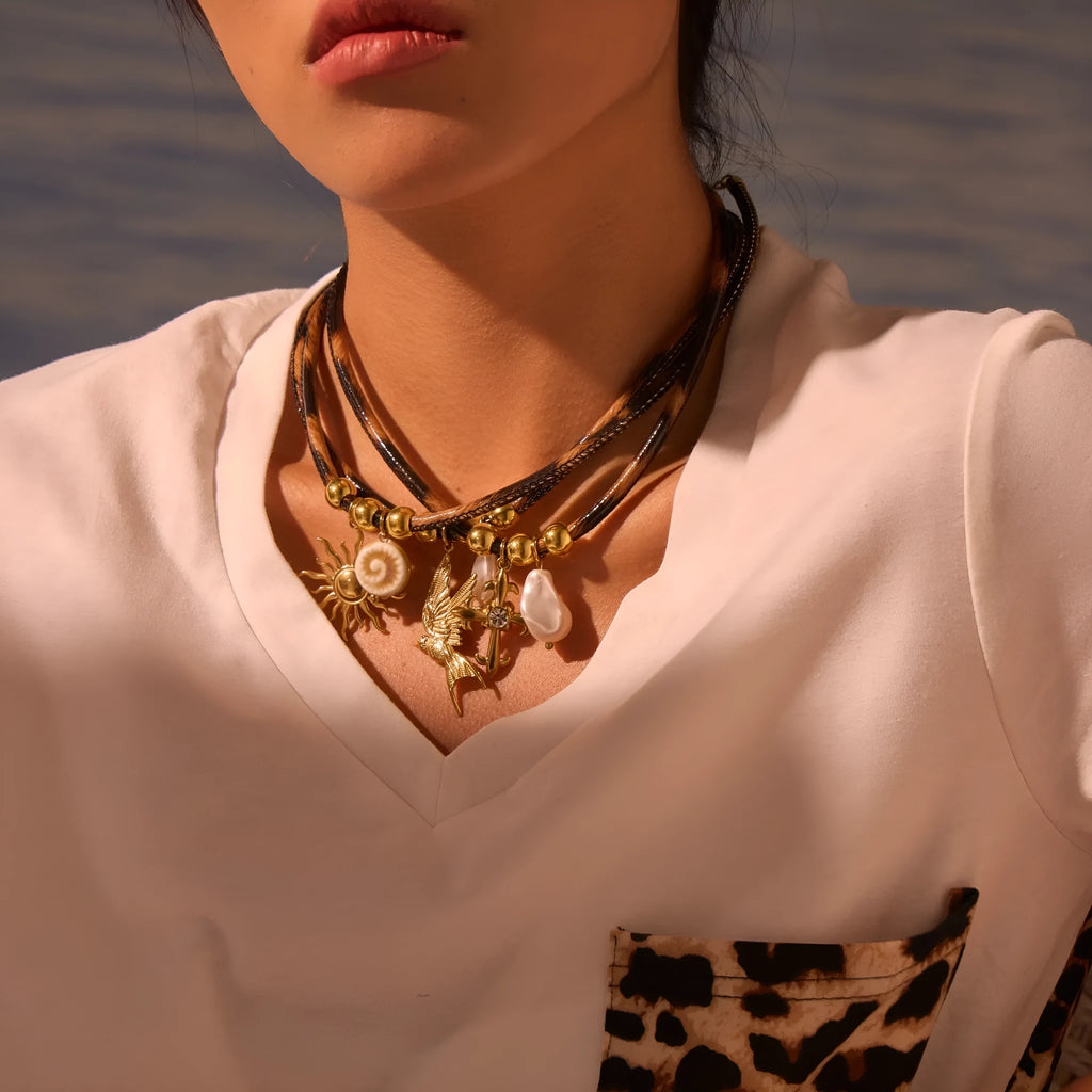 Women's stainless steel necklace with geometric leopard leather pendant on adjustable chain