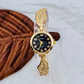 Round stainless steel women's watch with gold dial surface and Vachette clasp buckle