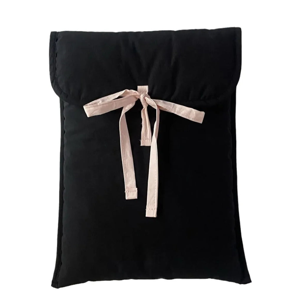 Women's black and white striped quilted computer bag with ballet style bow detail