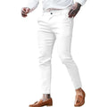Men's slim fit stretch cotton pencil pants in a solid colour on a model.