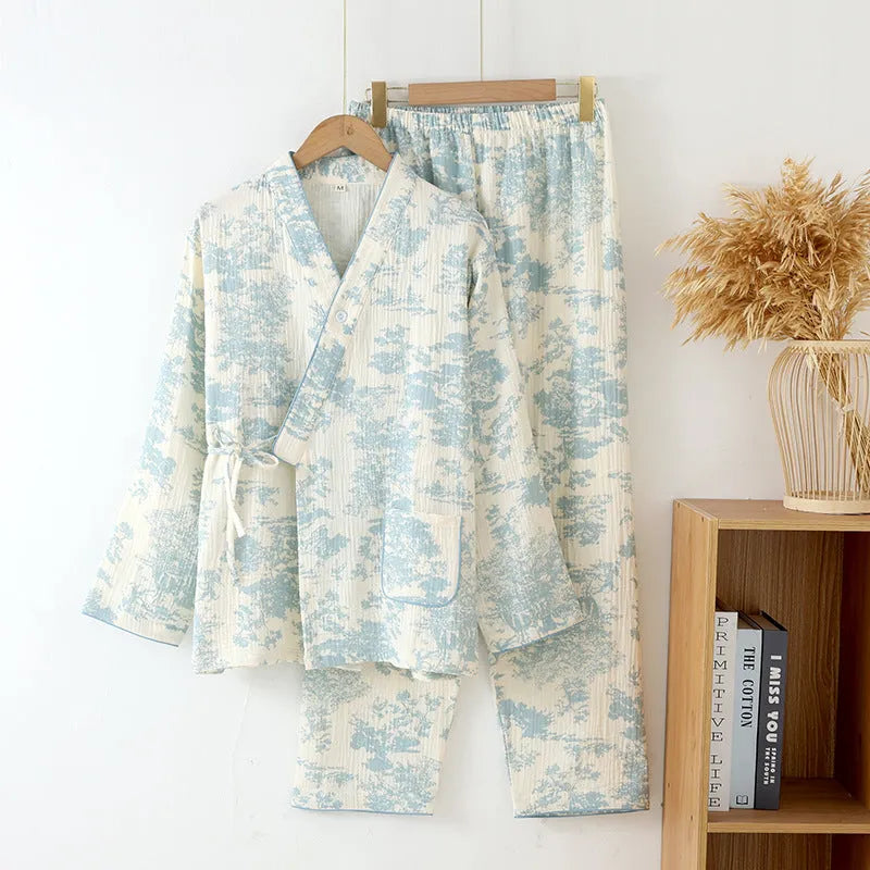 Women's cotton gauze loungewear set showing long sleeve shirt and matching trousers with lace-up detail in pastel colour