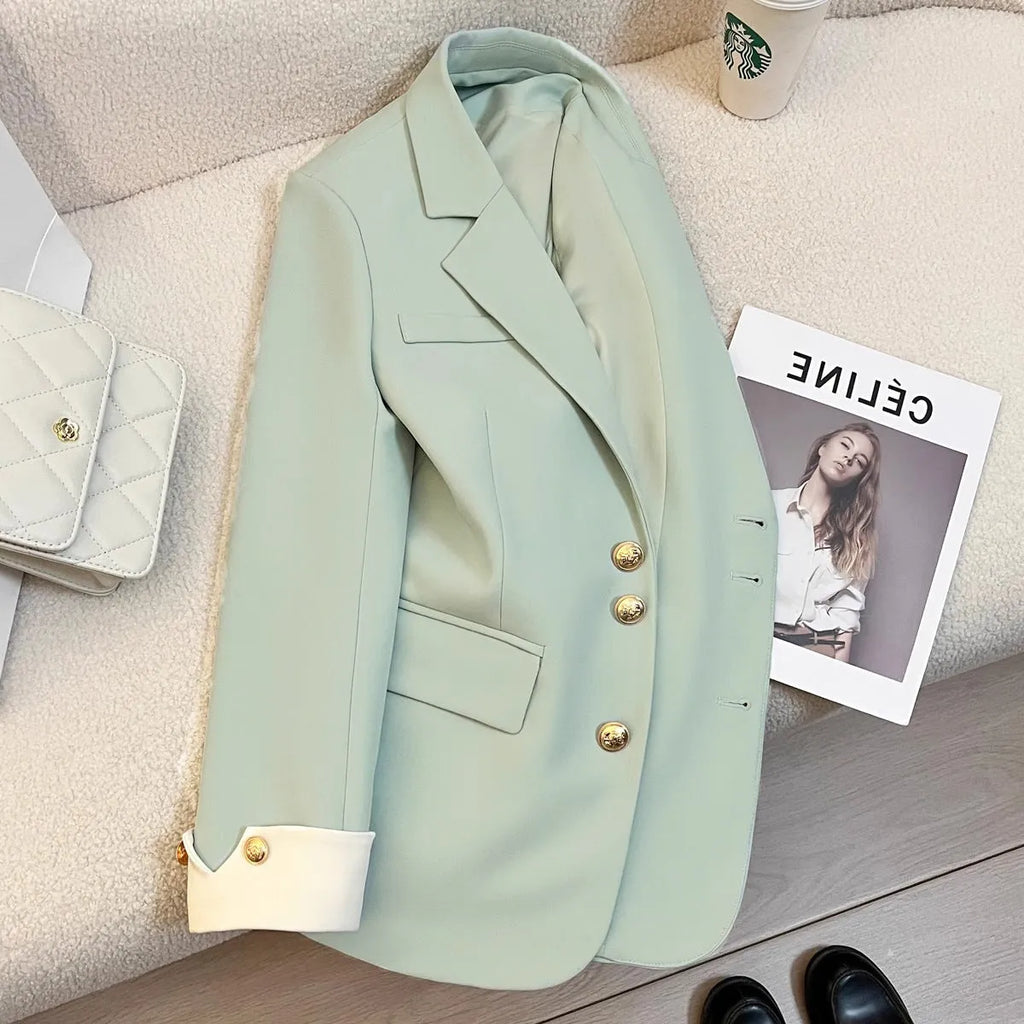 Korean style women's loose fit trench coat in milky white with pockets and regular long sleeves