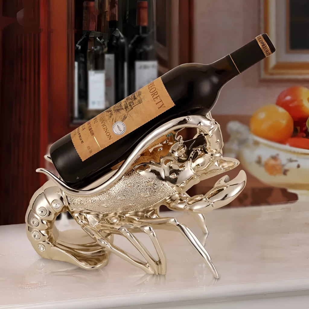 Resin lobster-shaped wine rack ornament in metallic finish holding wine bottle