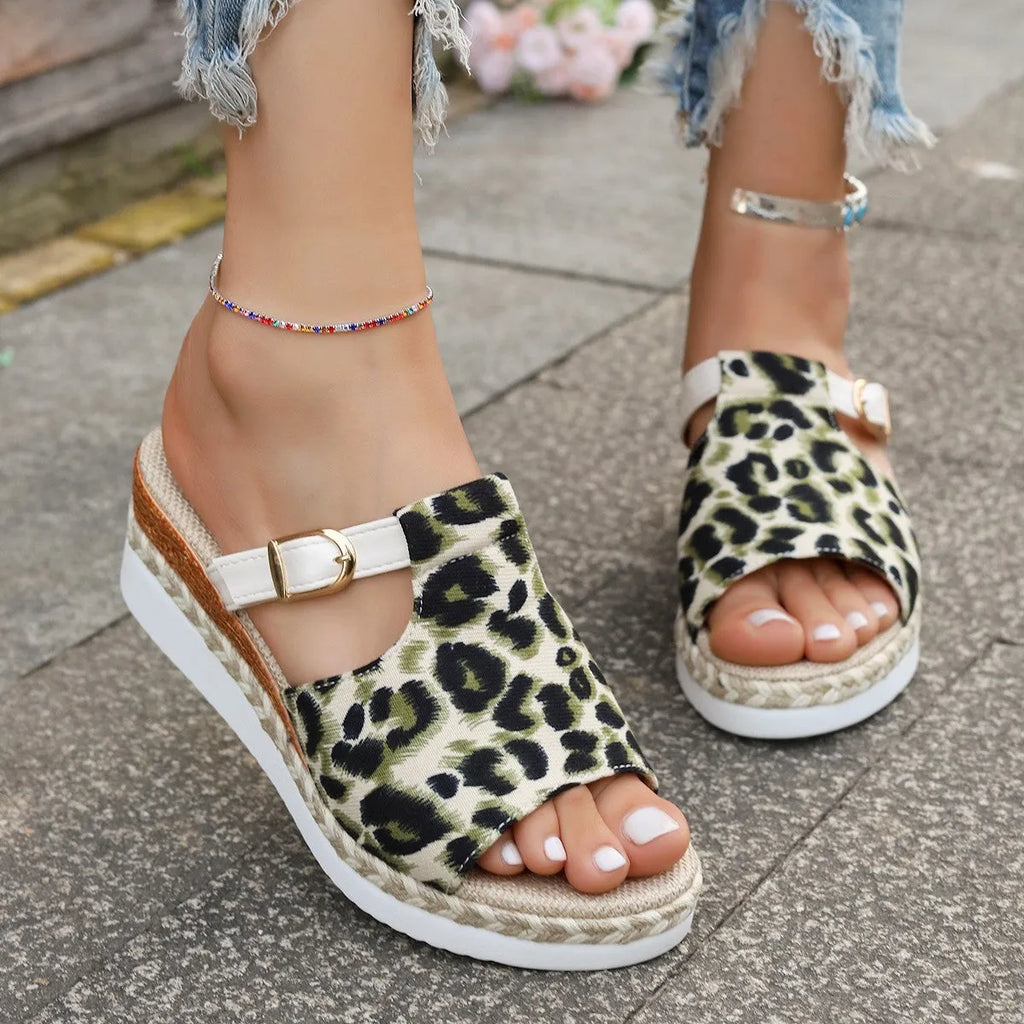 Leopard print wedge platform sandals with PU upper in light green colour, showing fishmouth toe design.