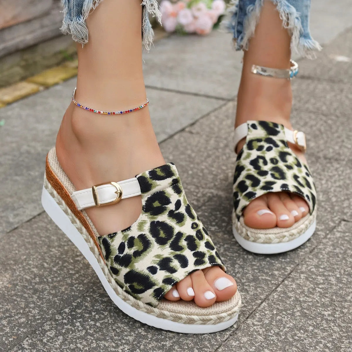 Leopard print wedge platform sandals with PU upper in light green colour, showing fishmouth toe design.
