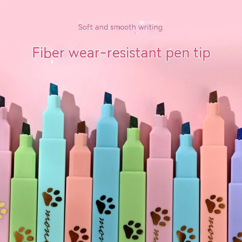 Box containing six Cat's Paw fluorescent marking pens with oblique nibs in assorted colours.