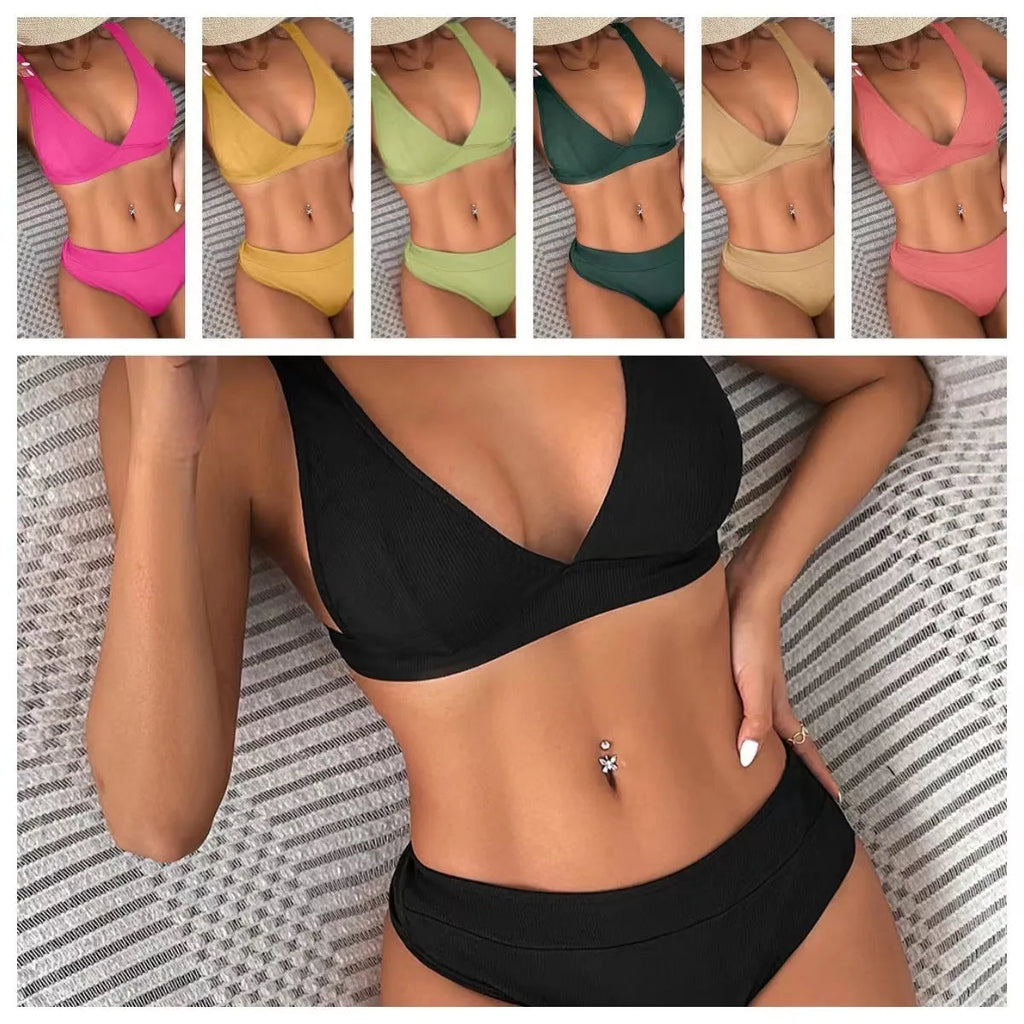 Women's black lace-up front bikini with split sides on a mannequin, showing high-waisted fit.