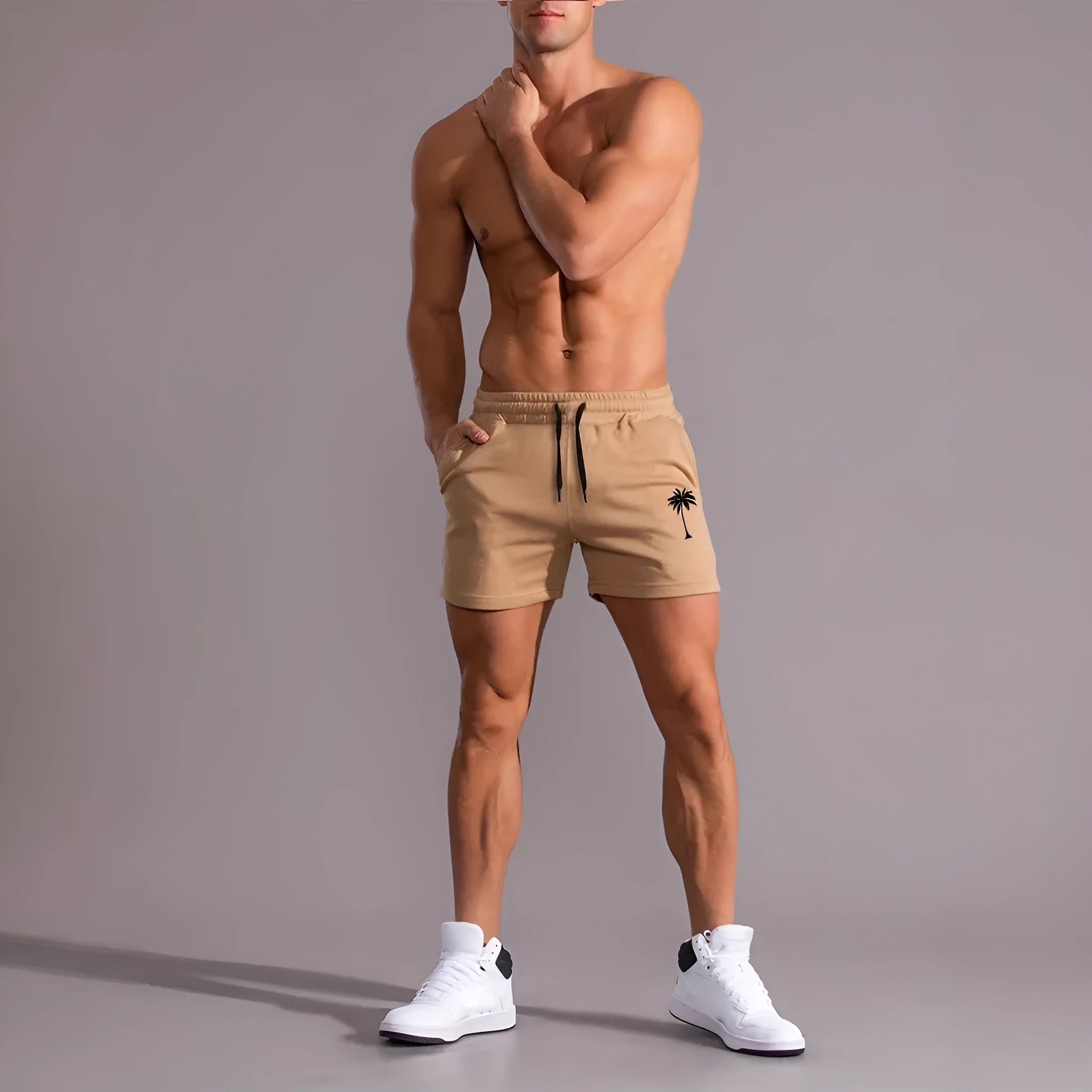 Khaki men's coconut print sports shorts with straight leg and elastic waistband