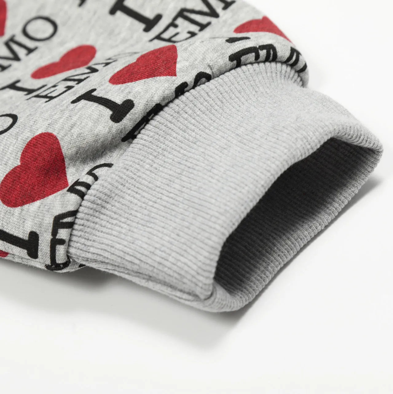 Women's melange grey cotton hooded cardigan with a retro pattern, shown on a model.