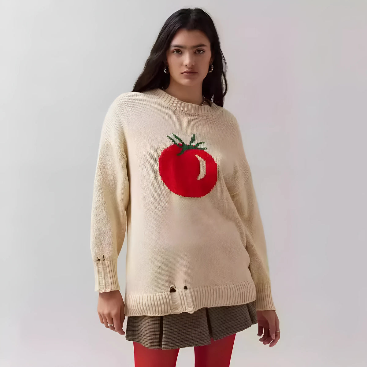 Women's milky white acrylic jacquard knit pullover sweater with round neck and long sleeves.