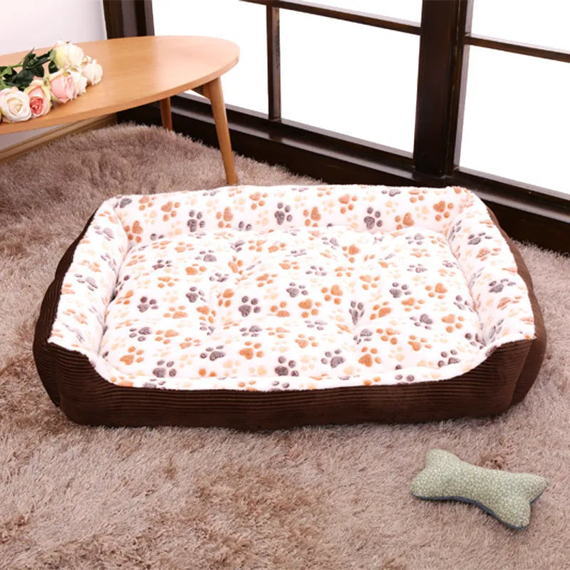 Beige plush pet bed with raised sofa-style edge and removable cushion for small dogs