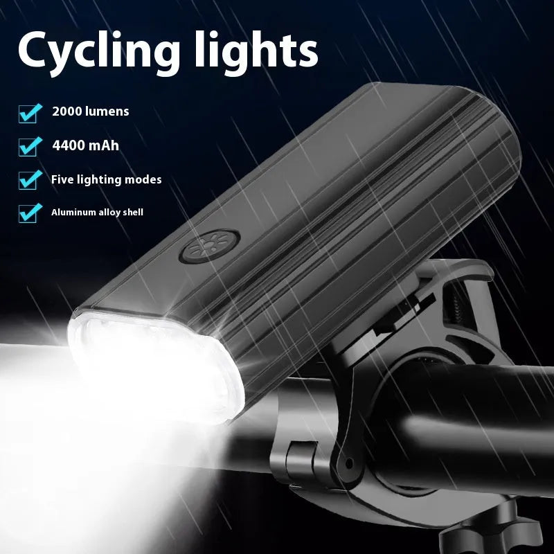 Silver aluminium bicycle headlight showing six XPT lamp beads with USB-C port and quick release mounting brackets