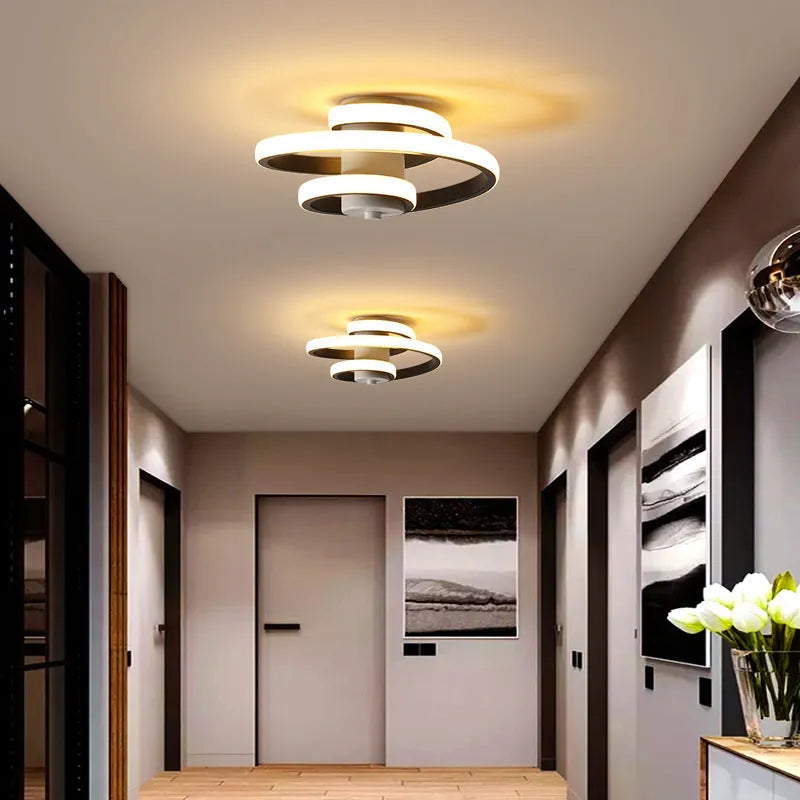 Modern LED corridor light with silicone shade for hallways and entranceways in black or white finish