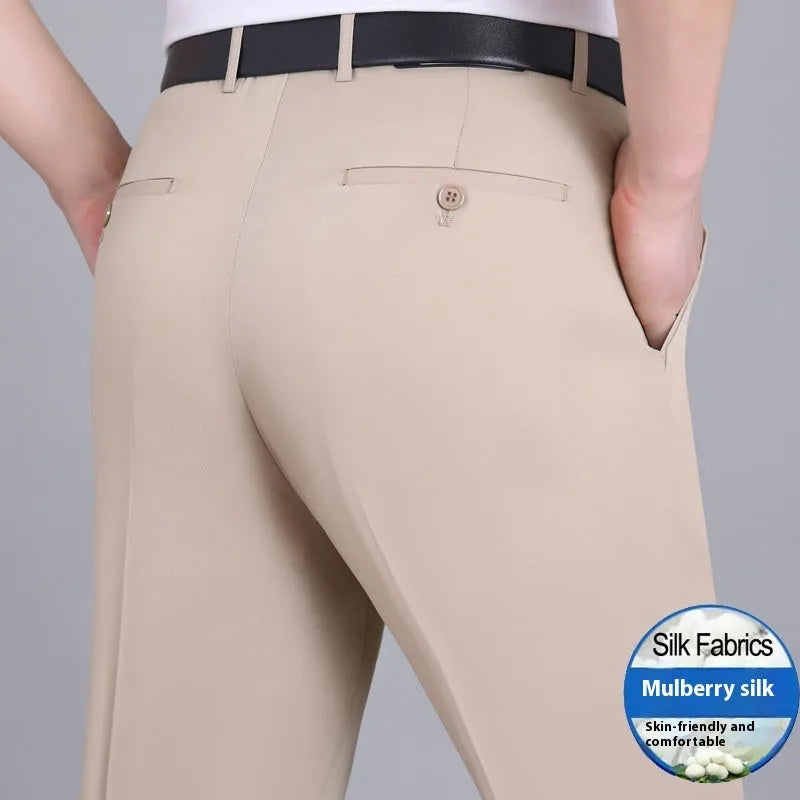 Men's straight-cut non-iron business trousers in a mulberry silk blend fabric on a hanger.