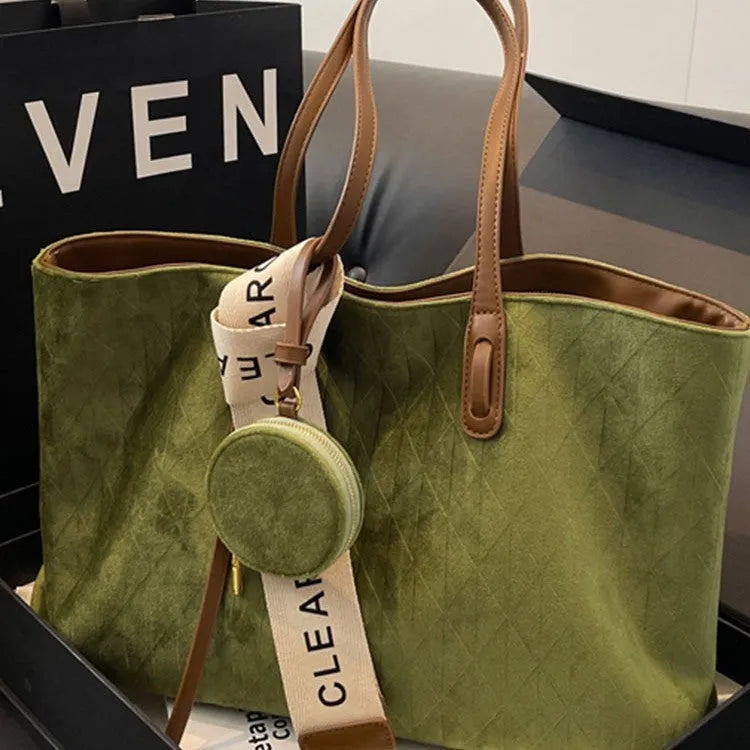 Large casual shoulder bag in horizontal square shape with sandwich pocket design and zip internal compartment