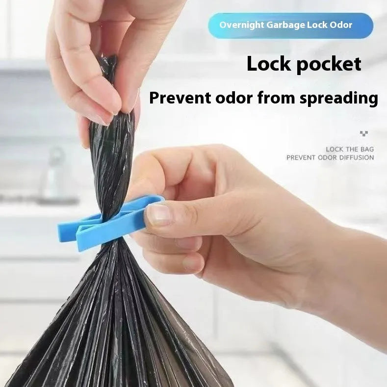 Polypropylene garbage bag fixing clip for holding bin liners securely to trash can sides.