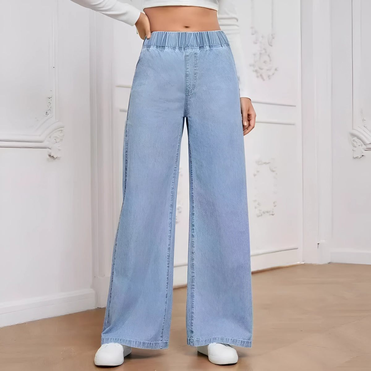 Women's light blue washed wide-leg denim jeans with straight fit and mid waist