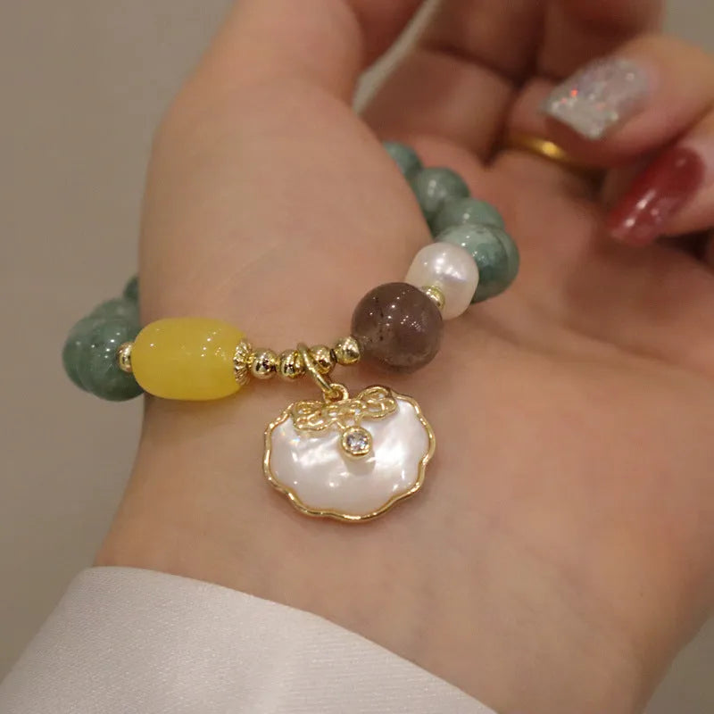Natural green jade shell bracelet on adjustable cord for women's casual jewellery
