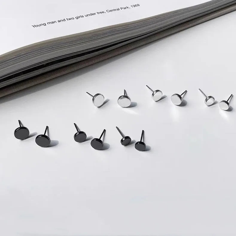 Sterling silver S999 flat bone stud earrings in geometric round shape showing silver and black colour options