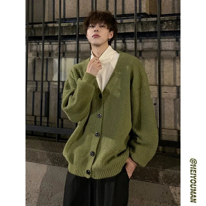 Retro loose fit men's V-neck knit cardigan in army green colour showing casual long sleeve design