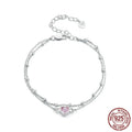 Women's 925 sterling silver bracelet with a small heart-shaped pendant on an adjustable chain.