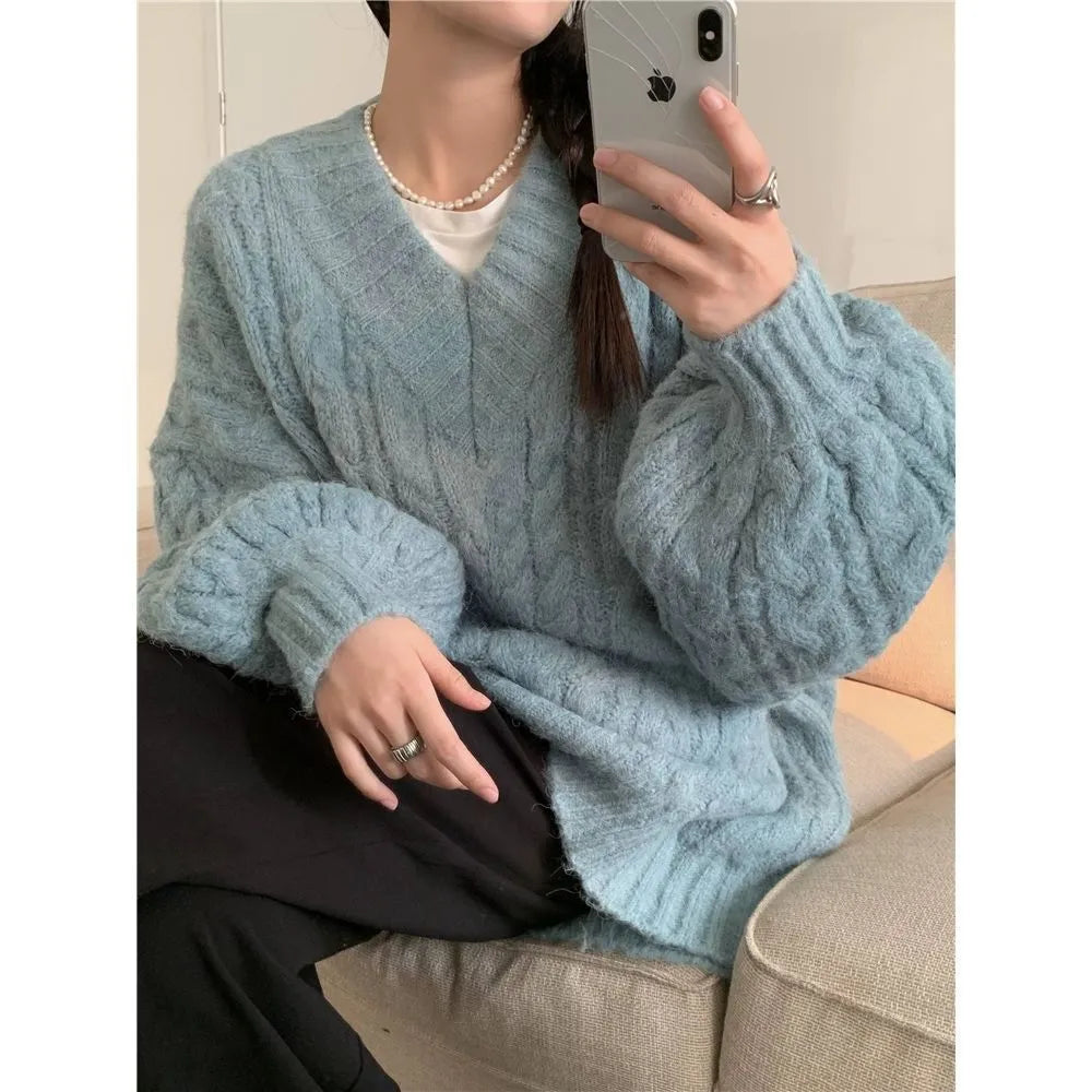 Thick knitted sleeveless sweater top with crocheted flower detail in loose fit free size polyest