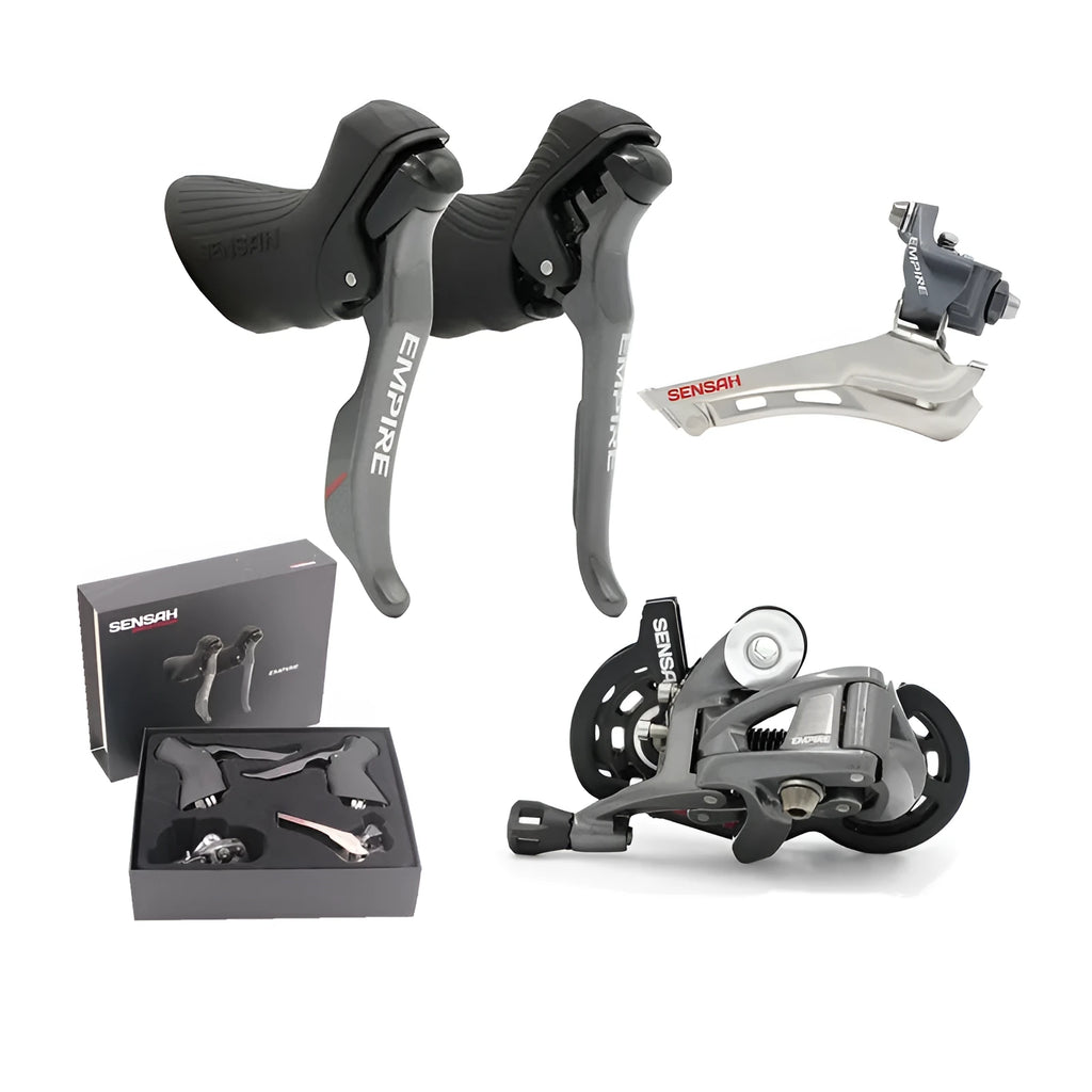 Road bike transmission kit with aluminium manual shift lever, front dial, and short leg rear derailleur.