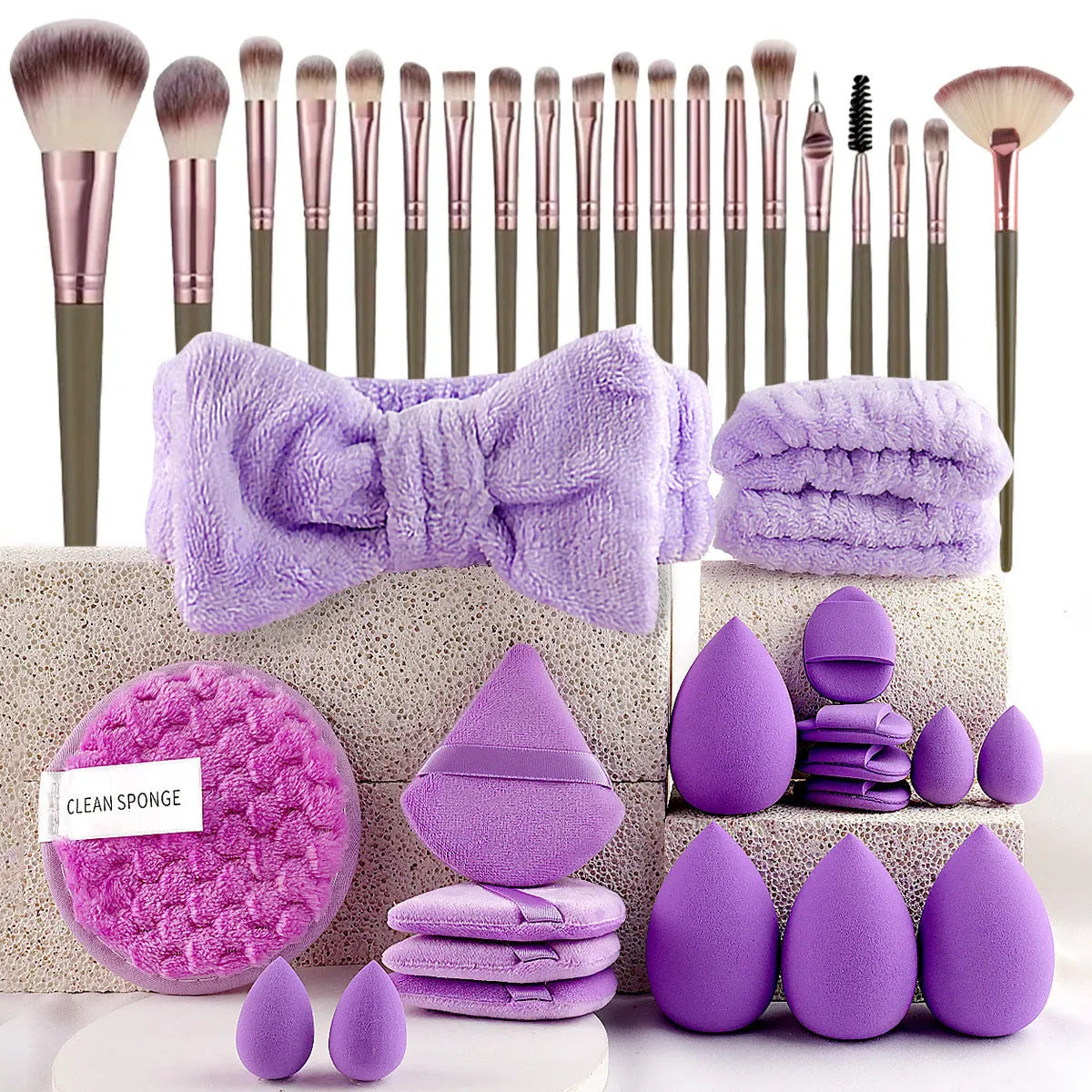 Beauty tool combination set with hydrophilic non-latex material in brown, pink, and purple colours