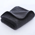 Small braid twisted car cleaning towel in grey with red edge trim, showing textured surface