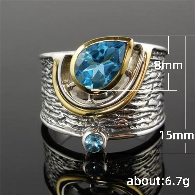 Blue zircon ring with drop shape design and Chinese style influences