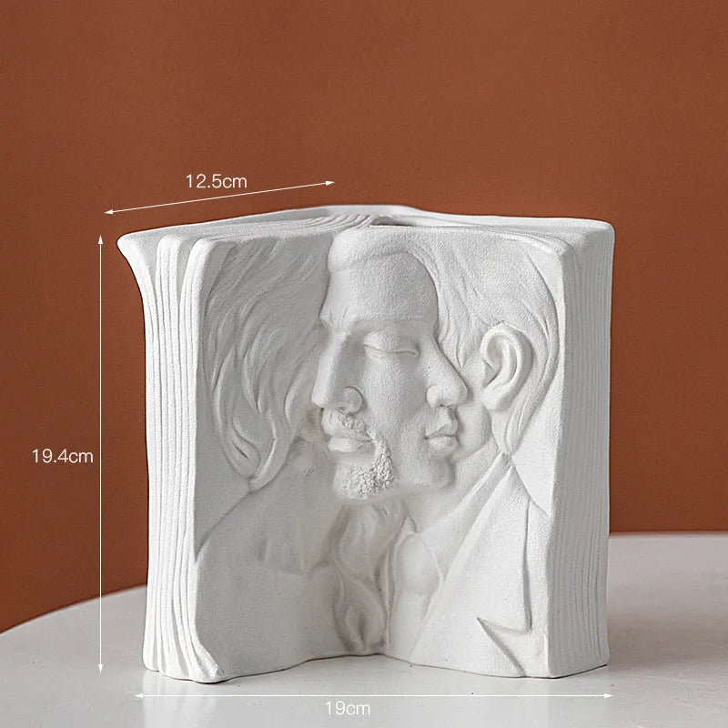 Ceramic book stand with glazed surface in one of four artistic designs: lover, dancer, beauty and beast, or brushed face