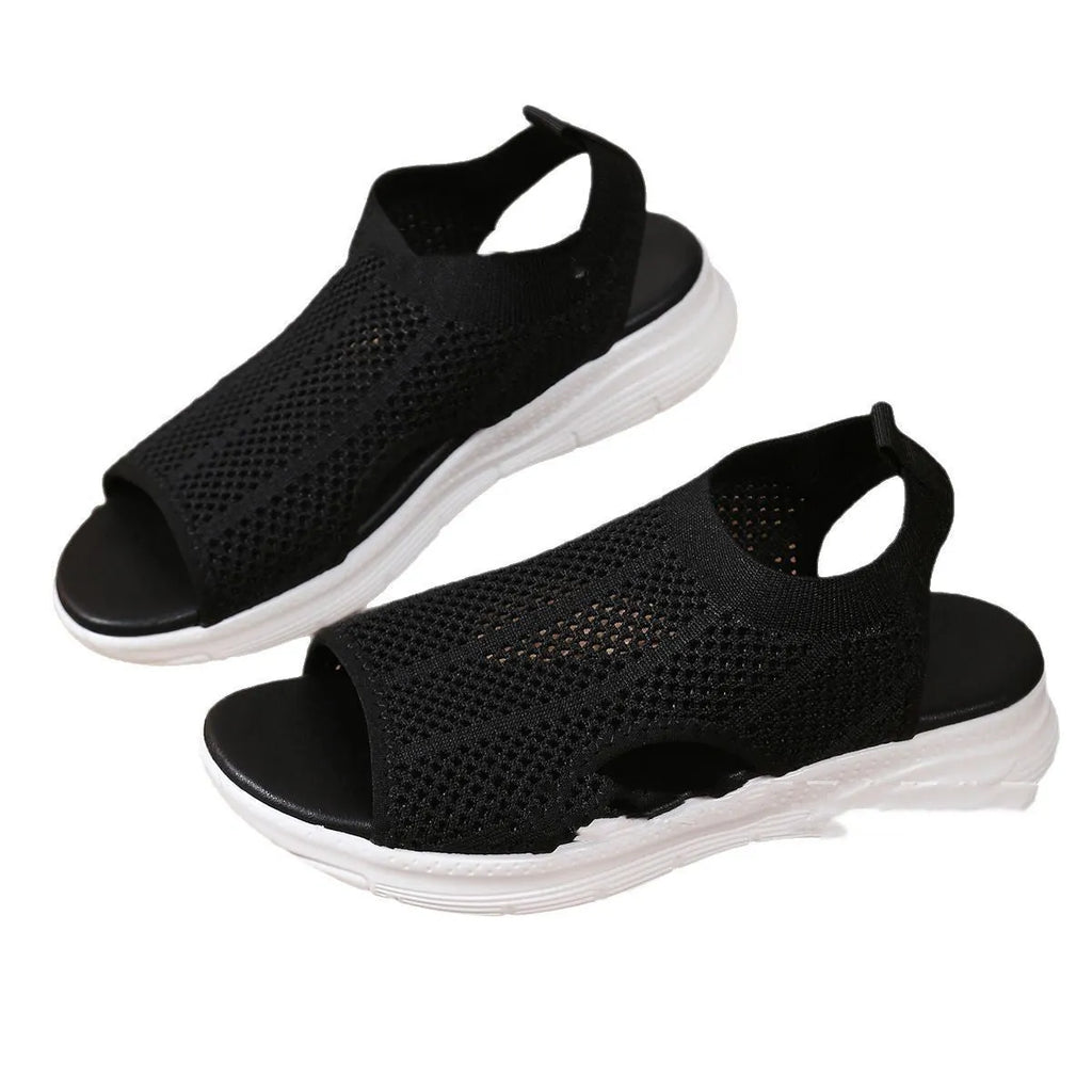 Women's platform sports sandals in pink with a flat head toe bracket and rubber sole