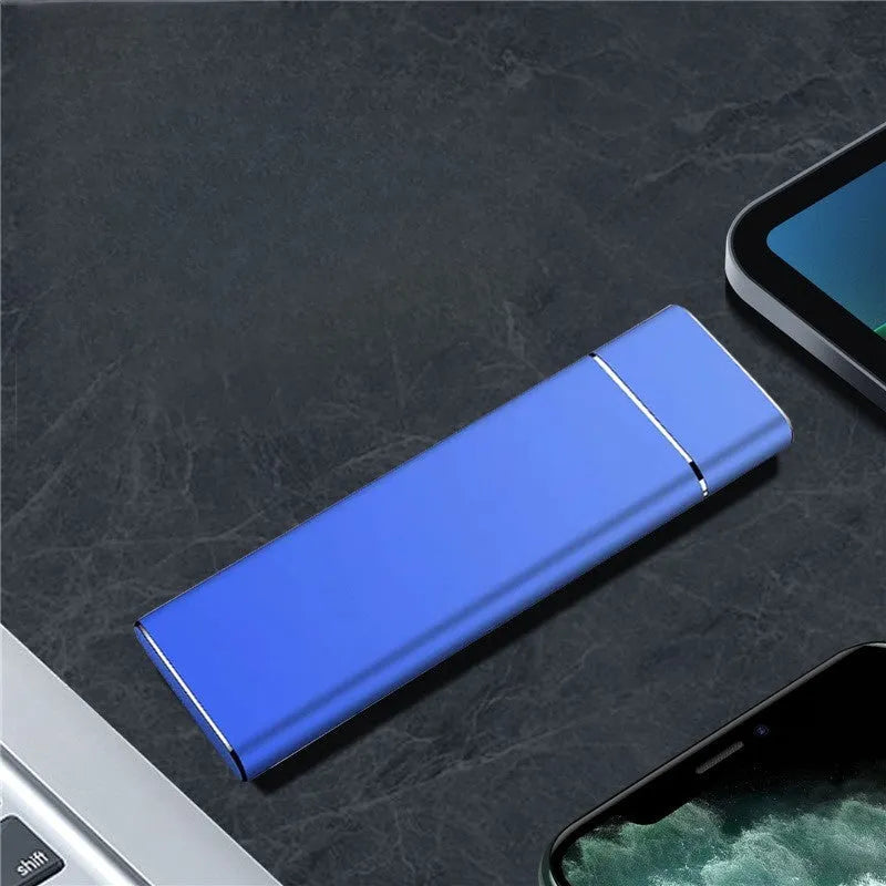 Sapphire blue portable solid state hard drive with metal shell measuring 10.3cm long