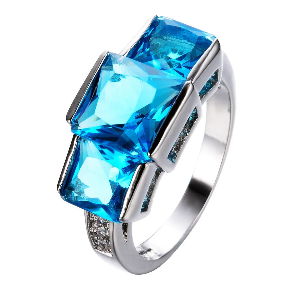 Women's copper ring ornament with geometric rainbow metal elements in ten electroplated colours