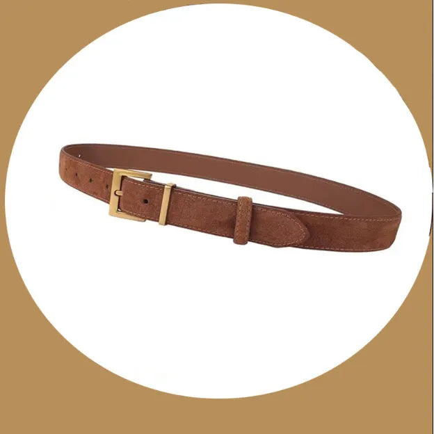 Ladies' black genuine leather belt with a silver alloy quadrilateral pin buckle on a white background.