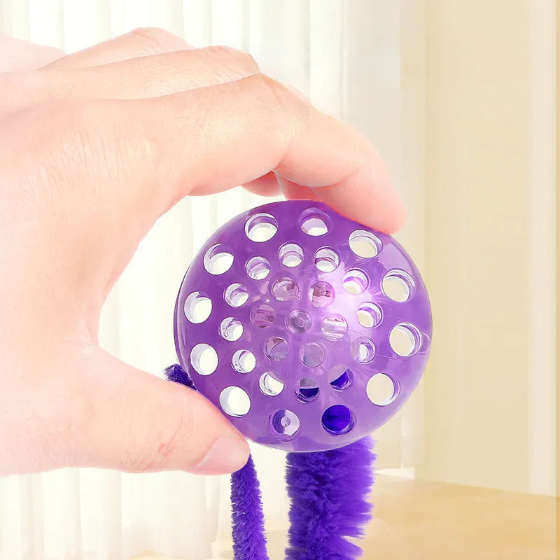 Interactive cat ball toy with bouncy TPR ball and plush worm tail in green colour