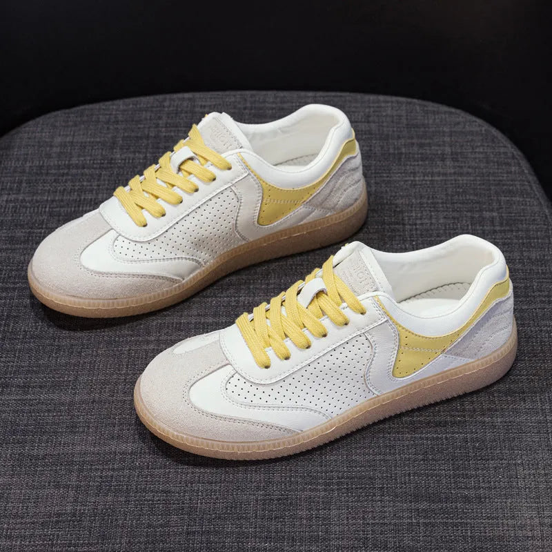 Breathable hollow casual shoes in white with cowhide upper, flat heel, and round toe