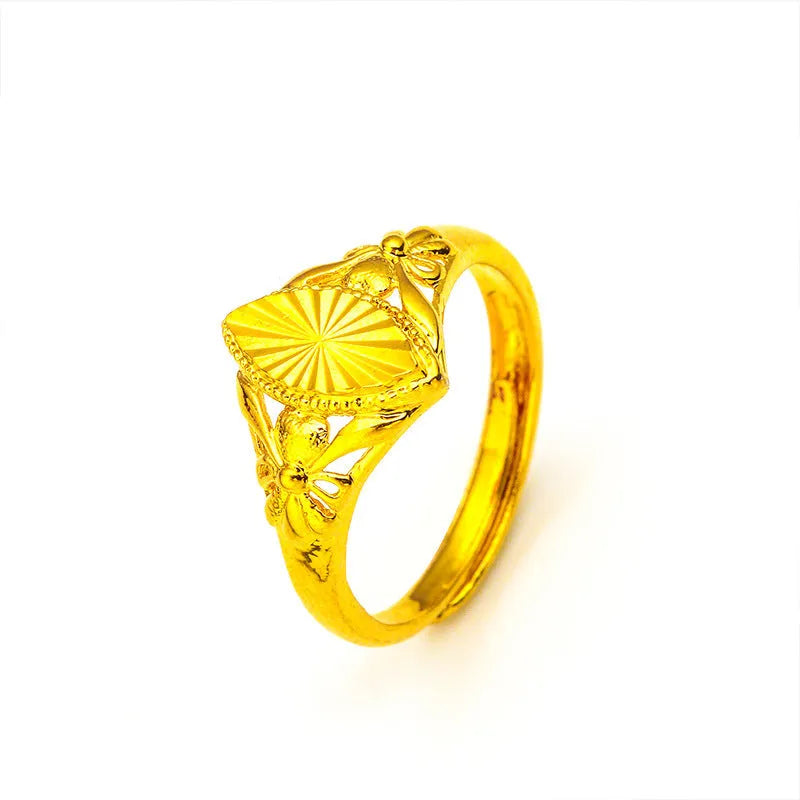 Electroplated gold brass ring with geometric open diamond floral design and textured detailing