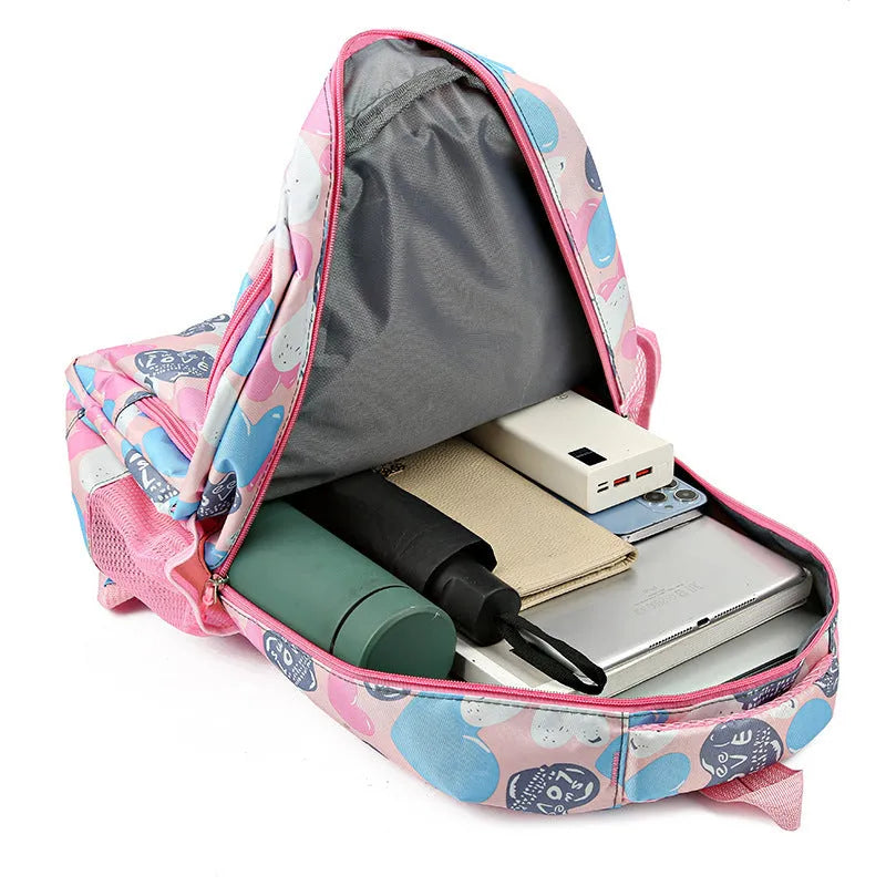 Blue student school backpack with air pillow belt straps and large main compartment.